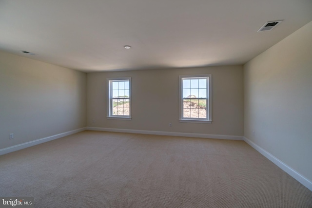 empty room with light carpet