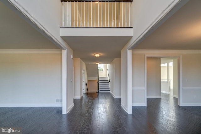 entryway with dark wood-type flooring