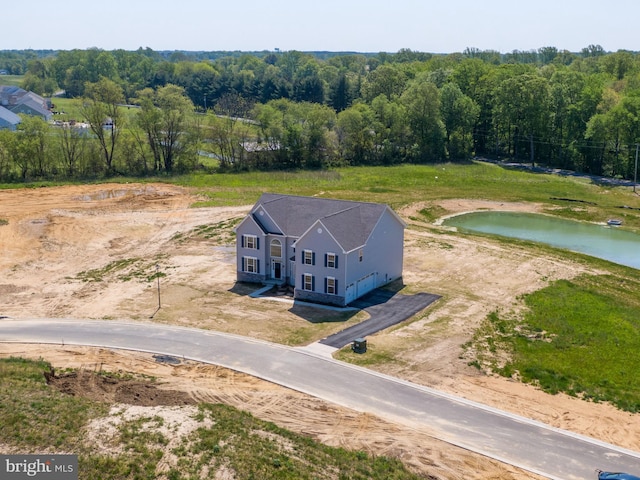 drone / aerial view featuring a water view