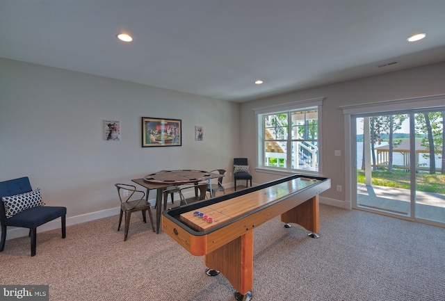 playroom featuring light carpet