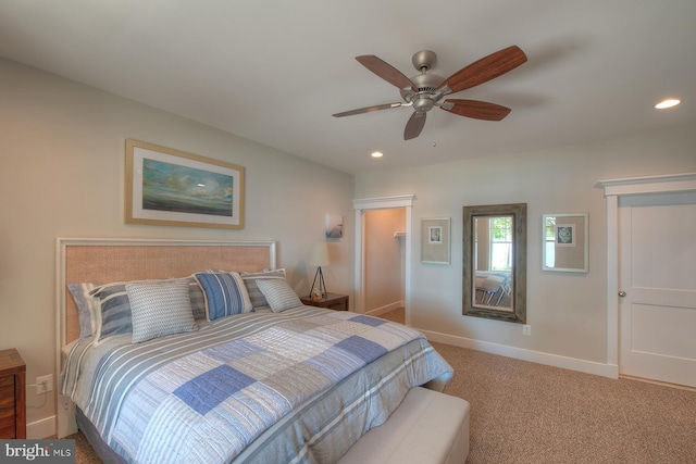 carpeted bedroom featuring ceiling fan