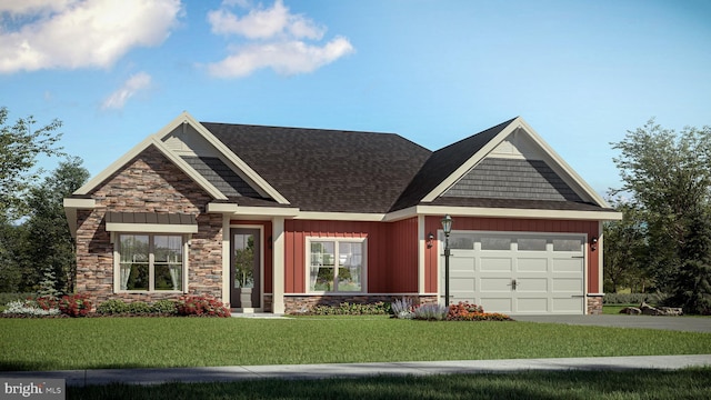 view of front of house featuring a front yard and a garage