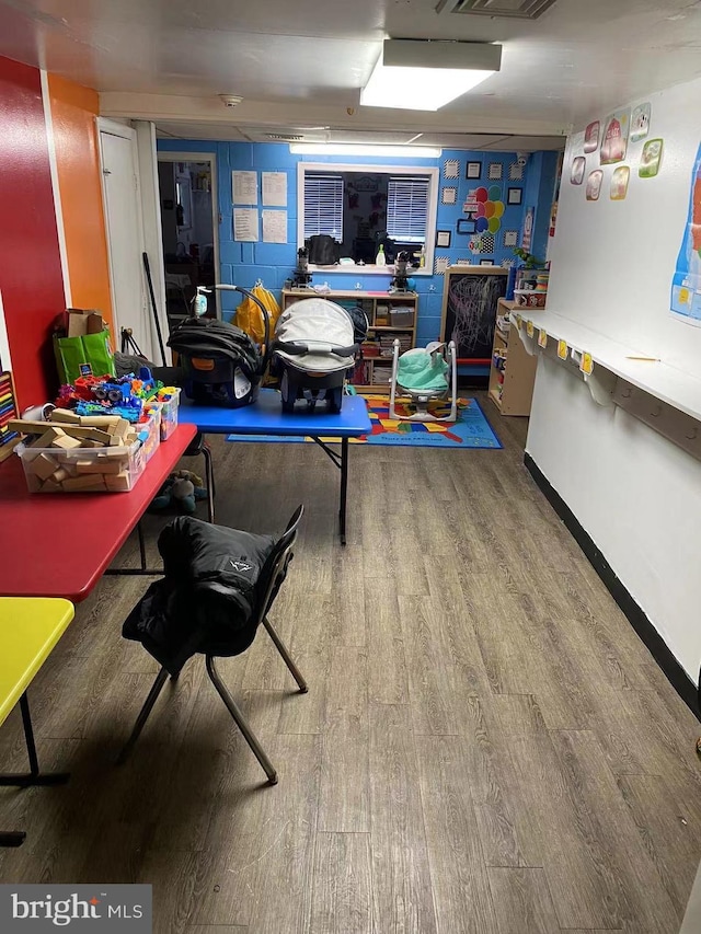 interior space with hardwood / wood-style floors