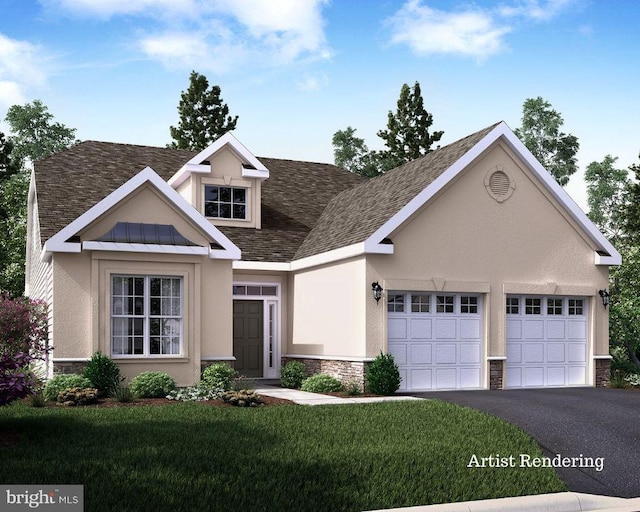 view of front of house with a front lawn and a garage