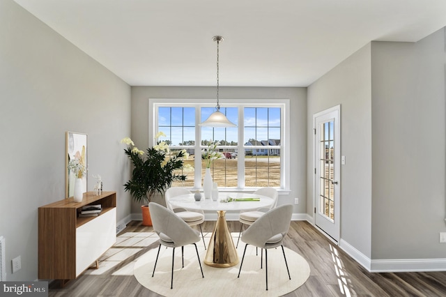 dining space featuring light hardwood / wood-style flooring