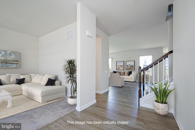 living room featuring dark hardwood / wood-style floors