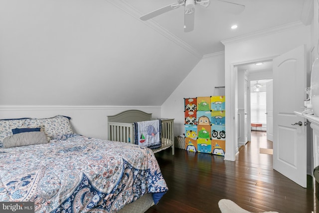 bedroom featuring crown molding, ceiling fan, dark wood-type flooring, and lofted ceiling