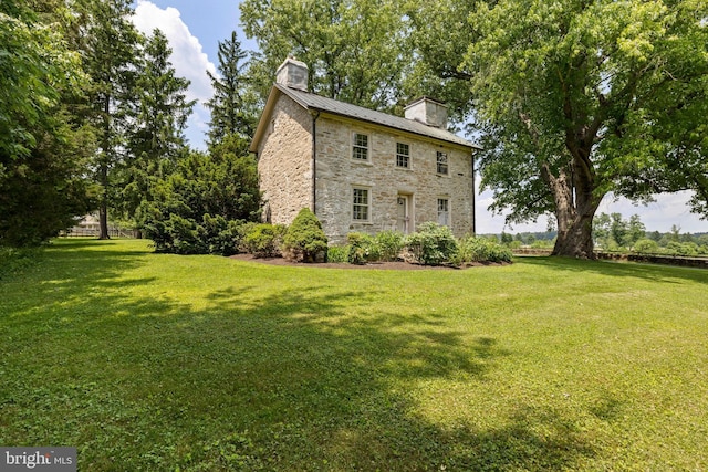 exterior space with a front lawn