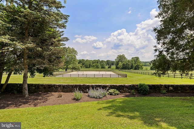 view of home's community featuring a lawn