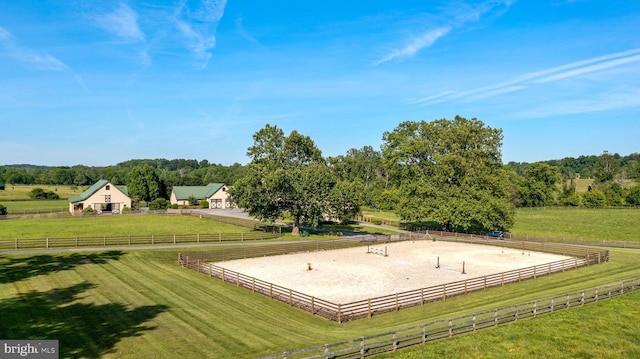 exterior space with a rural view and a lawn