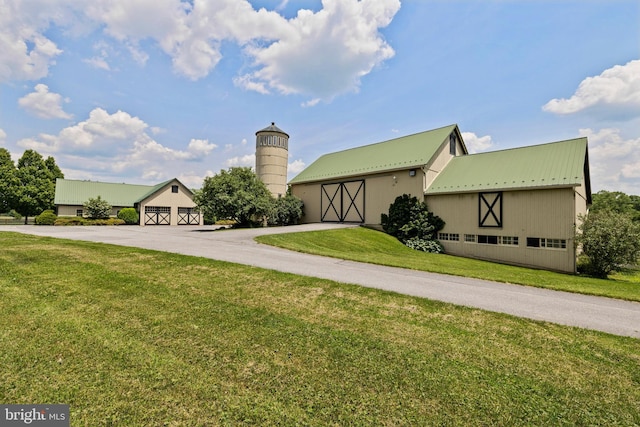 tudor home with a front yard