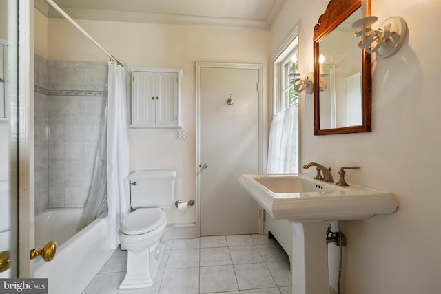 bathroom featuring toilet, ornamental molding, shower / bath combination with curtain, tile floors, and an inviting chandelier