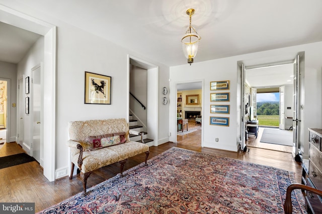 sitting room with dark hardwood / wood-style floors