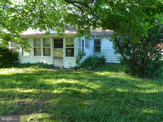 view of front of home with a front yard