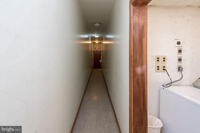 corridor with washer / clothes dryer