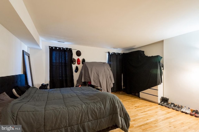 bedroom featuring light hardwood / wood-style floors