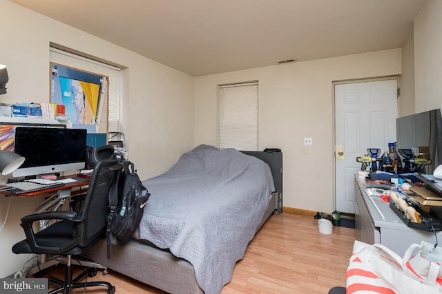 bedroom featuring light wood-type flooring