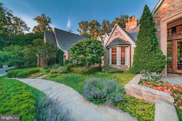 tudor house with french doors