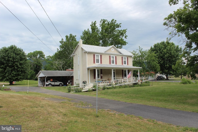 view of front facade featuring a porch and a front lawn