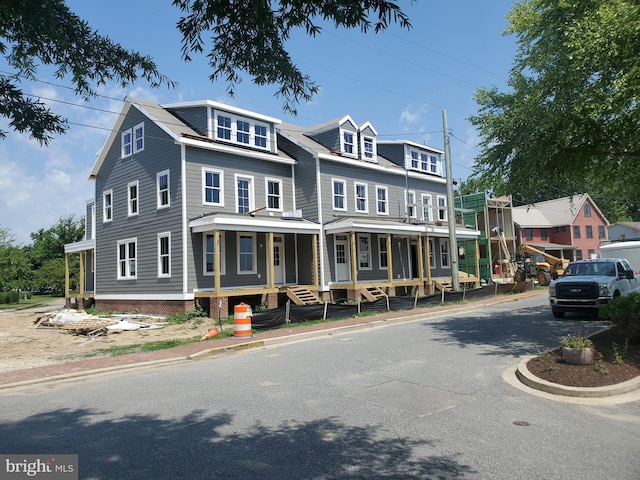 multi unit property featuring covered porch