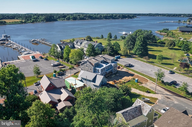 drone / aerial view with a water view