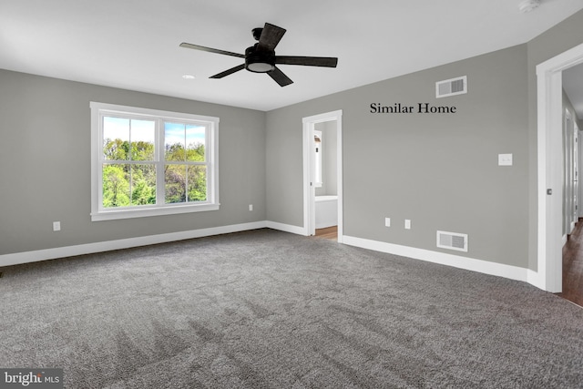 carpeted empty room with ceiling fan