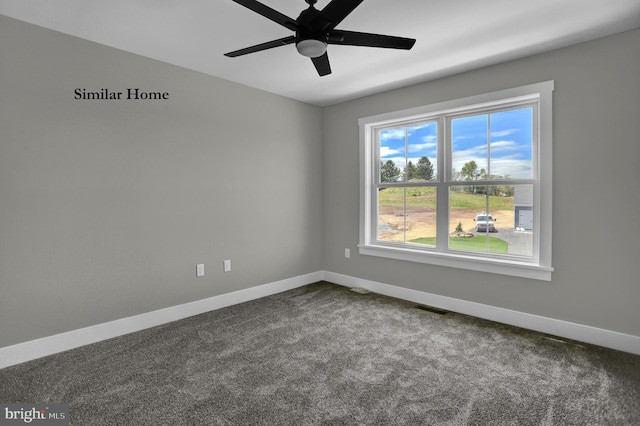 carpeted spare room with plenty of natural light and ceiling fan