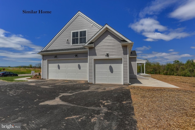 view of home's exterior featuring a garage