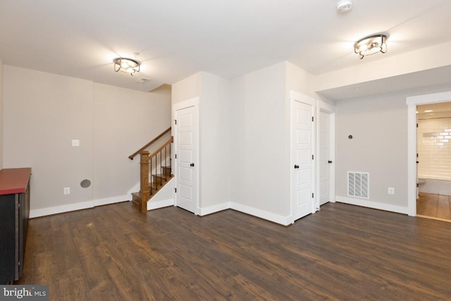 interior space with dark wood-type flooring