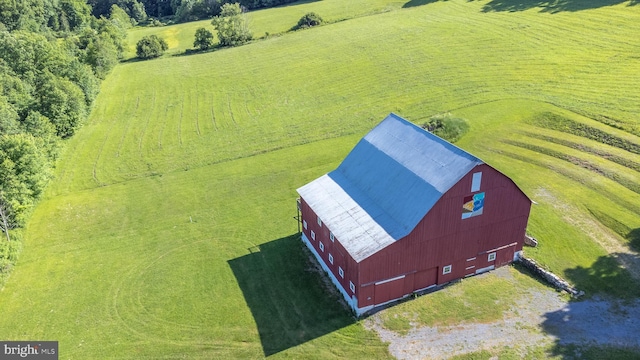 birds eye view of property featuring a rural view