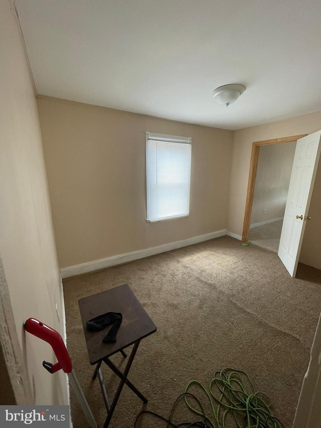 unfurnished bedroom with carpet floors