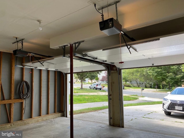 garage featuring a garage door opener