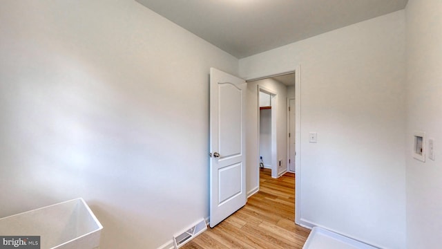 unfurnished room featuring light wood-type flooring