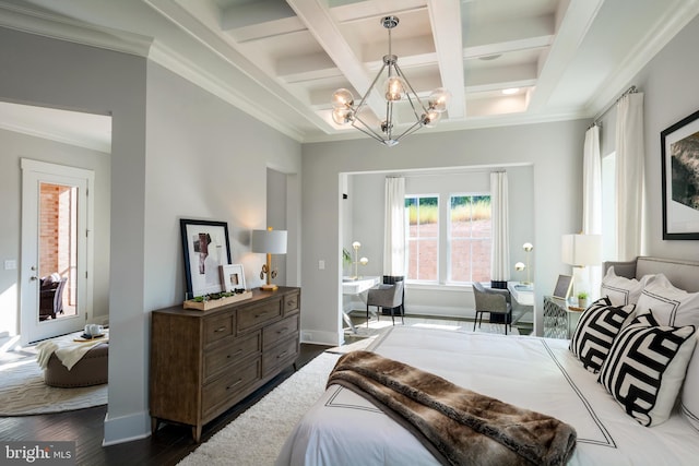 bedroom with crown molding, an inviting chandelier, coffered ceiling, and hardwood / wood-style floors