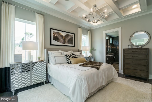 bedroom featuring ornamental molding, ensuite bathroom, beamed ceiling, coffered ceiling, and an inviting chandelier