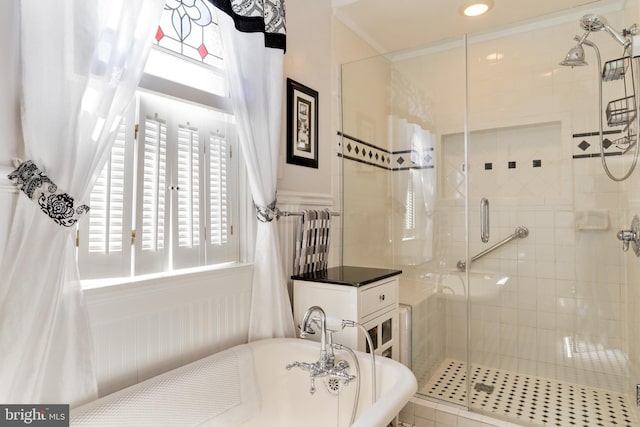 bathroom with shower with separate bathtub