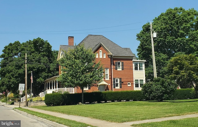 view of front of home with a front yard