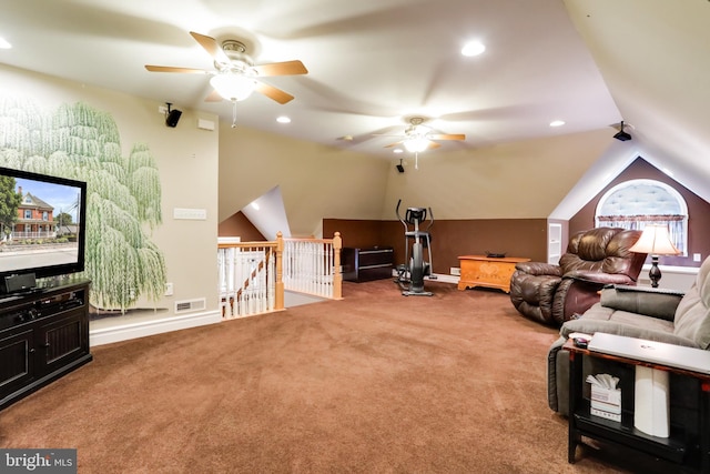 living room featuring ceiling fan, lofted ceiling, a healthy amount of sunlight, and light carpet