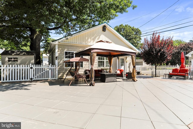 exterior space featuring a patio area and a gazebo