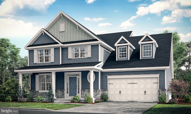 view of front of property with a porch and a garage