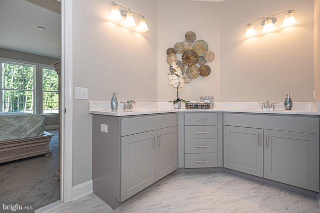 bathroom with double sink vanity and tile floors