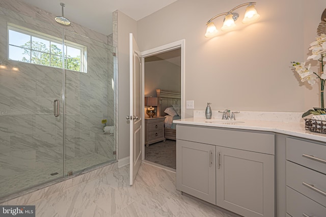 bathroom with an enclosed shower, tile floors, and vanity