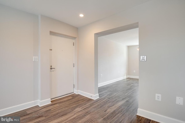 foyer with dark hardwood / wood-style flooring