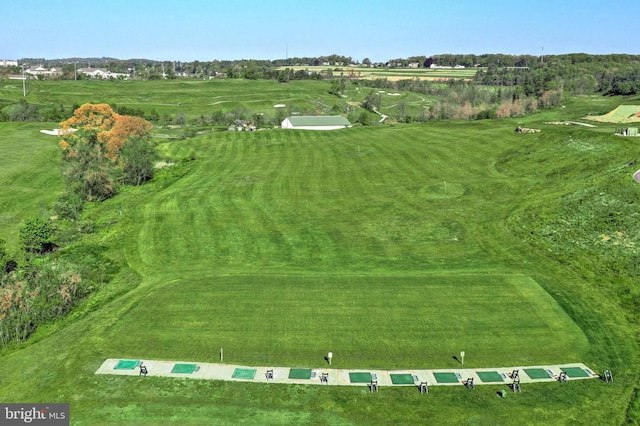 birds eye view of property with a rural view