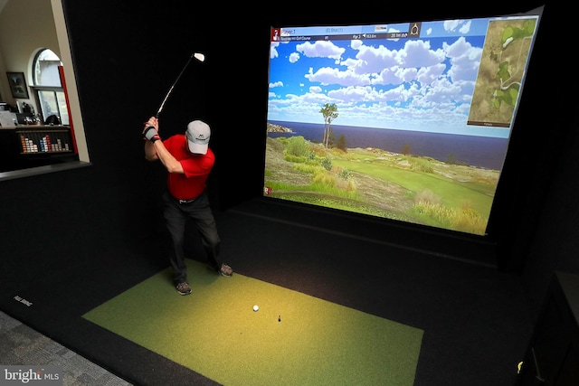 recreation room featuring golf simulator