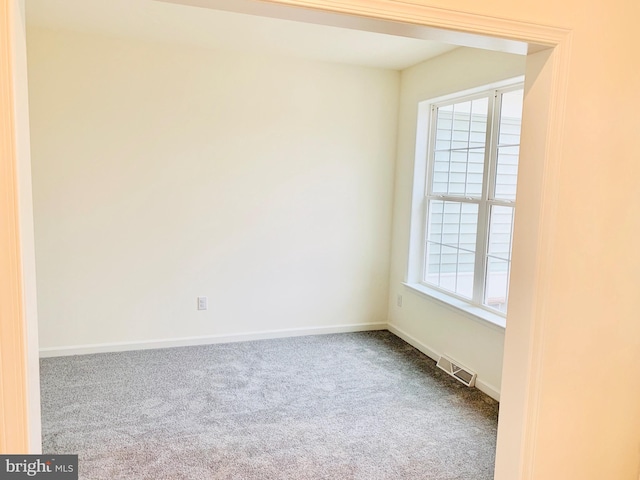 view of carpeted spare room