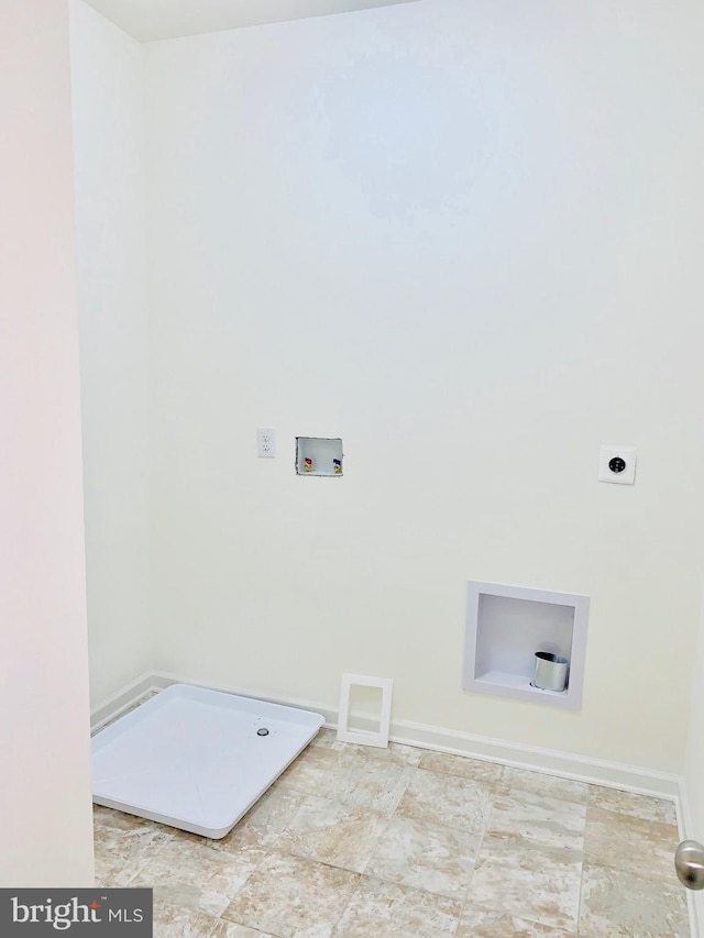 washroom featuring light tile flooring, hookup for a washing machine, and hookup for an electric dryer