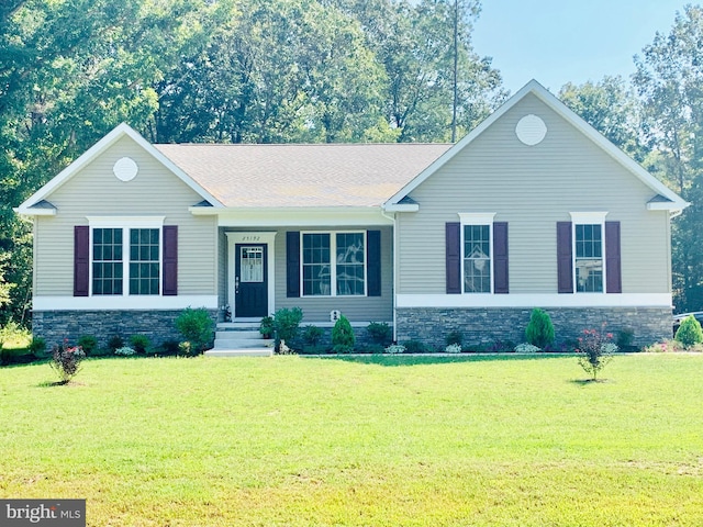 view of front of house with a front lawn