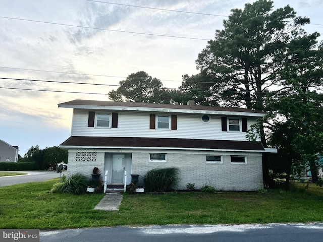 view of front of house with a front yard