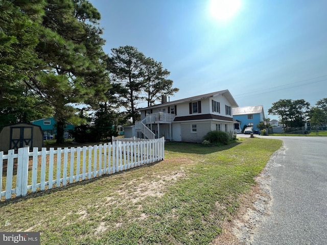 view of property exterior featuring a yard